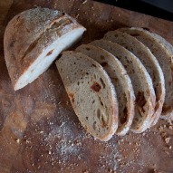 Sliced cheese and tomato sourdough loaf
