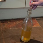 Filling bottles using a bottling stick