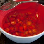 Tomatoes soaking in acidulated water