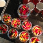 Pack chillies in jars