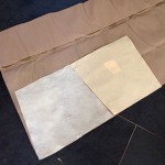 Cut out replacement bottoming cloth using old fabric as template