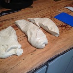 Divide risen dough into three